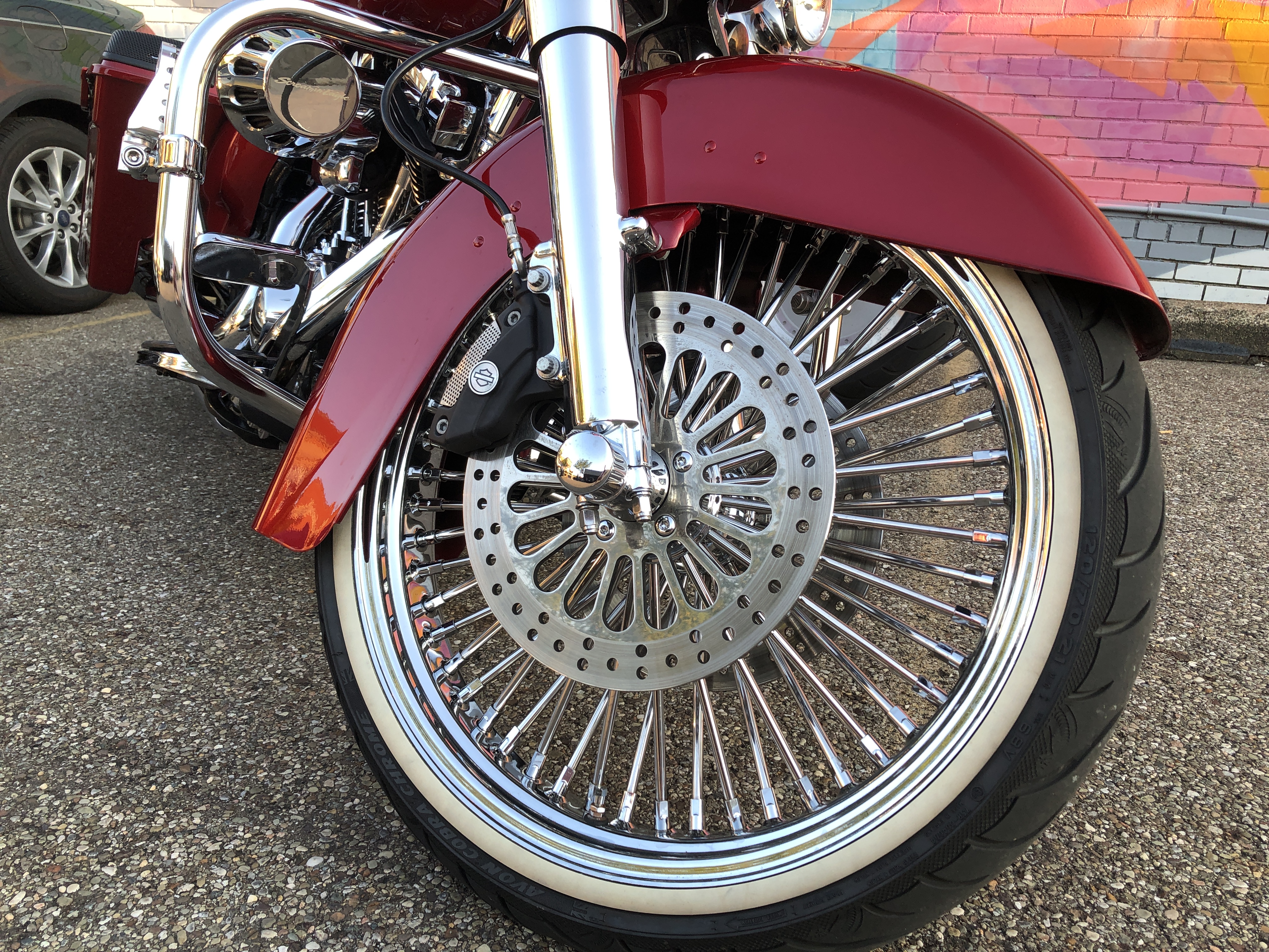 stylized motorcycle spoked wheel and disc brake rotor